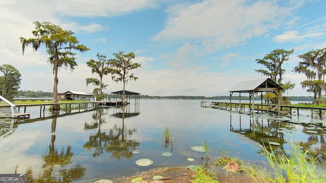 dock area featuring a water view