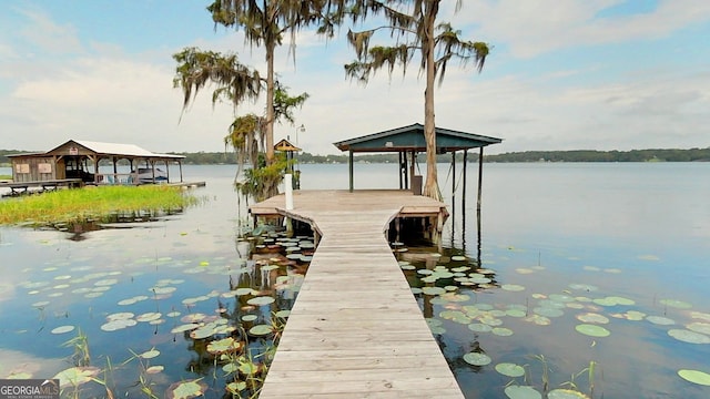 dock area featuring a water view