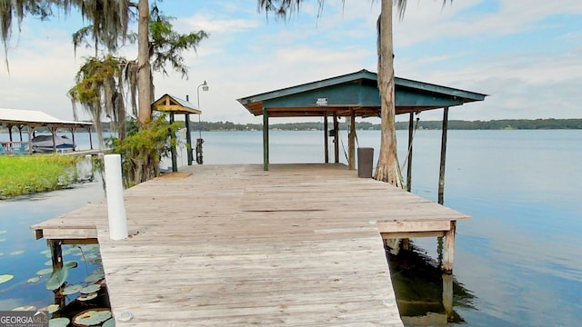 view of dock with a water view