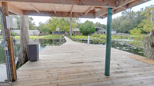 view of dock with a water view