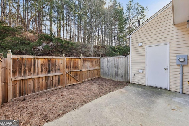 view of yard with a fenced backyard and a patio