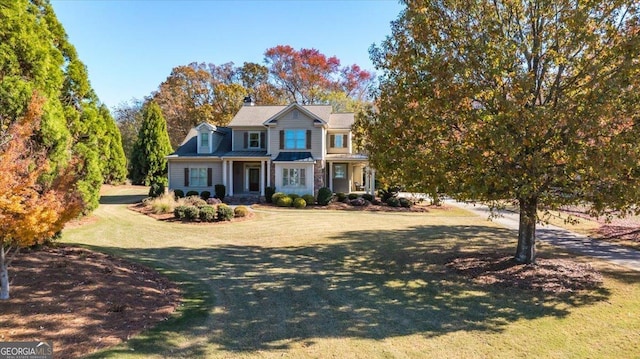 view of front facade with a front yard