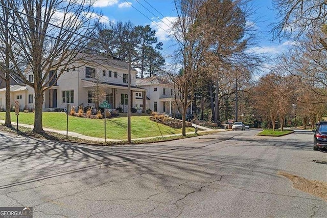 view of road with sidewalks and curbs