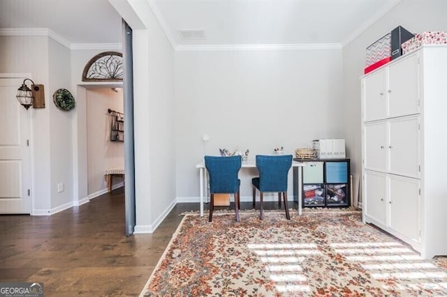 office area with crown molding, baseboards, and wood finished floors