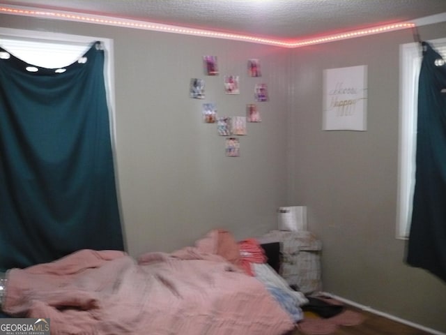 bedroom with a textured ceiling