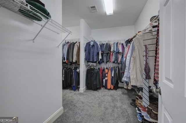 spacious closet with carpet and visible vents