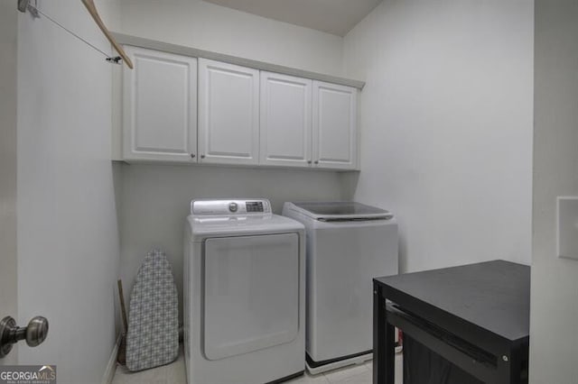 laundry area featuring cabinet space and independent washer and dryer