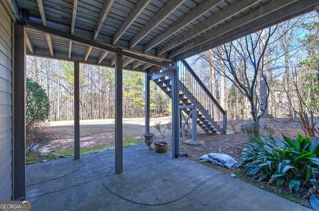 view of patio / terrace featuring stairway