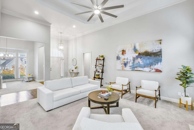 living room with baseboards, light colored carpet, a towering ceiling, ornamental molding, and recessed lighting