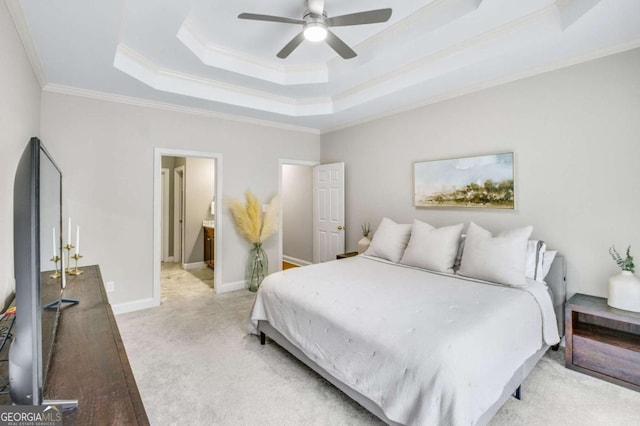 bedroom with light carpet, a ceiling fan, baseboards, a raised ceiling, and crown molding