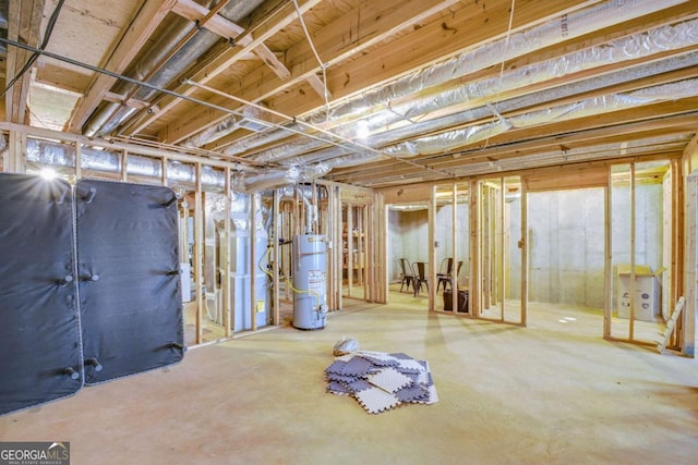 unfinished basement featuring water heater