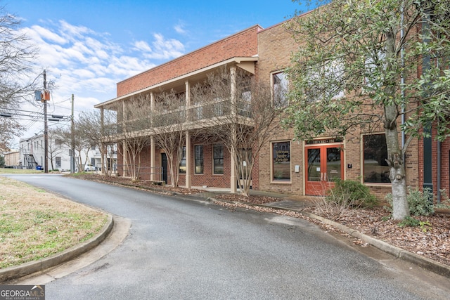 view of building exterior featuring driveway