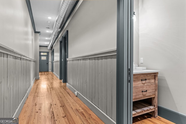 hallway featuring light wood-style floors