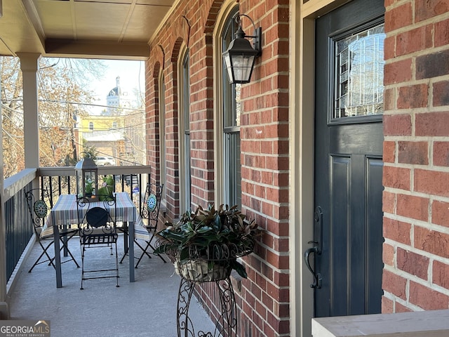 balcony featuring a porch