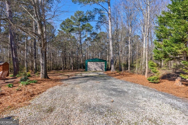 view of street with a wooded view