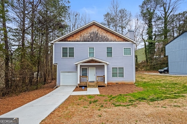 traditional-style home featuring an attached garage, a chimney, and a front yard