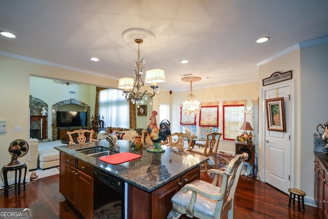 kitchen featuring dark wood-style flooring, black dishwasher, a center island with sink, open floor plan, and a sink