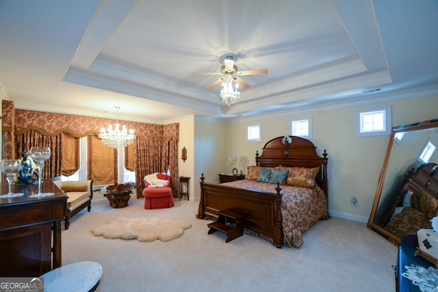 carpeted bedroom featuring multiple windows and a raised ceiling