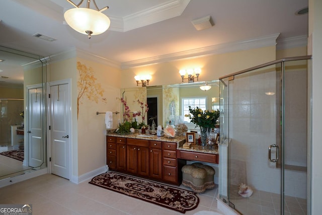 bathroom with vanity, visible vents, and crown molding