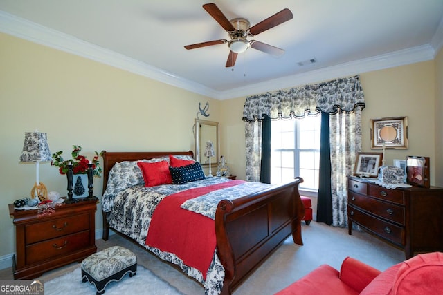 bedroom featuring light carpet, visible vents, ornamental molding, and a ceiling fan