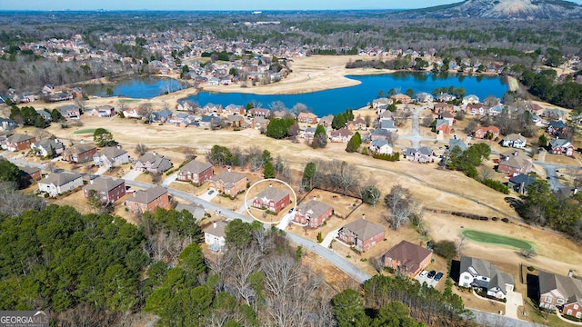 aerial view with a residential view and a water view