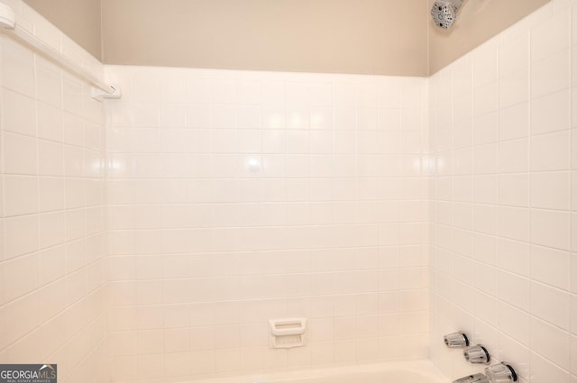 bathroom with shower / bathing tub combination