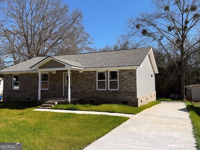 view of front of property featuring brick siding, a shingled roof, concrete driveway, crawl space, and a front lawn