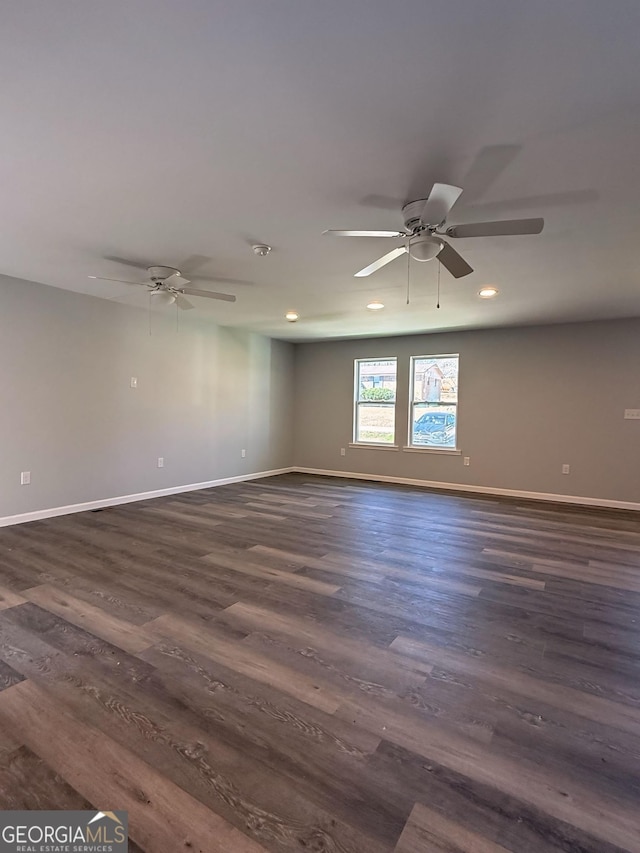 unfurnished room with dark wood-style floors, ceiling fan, baseboards, and recessed lighting