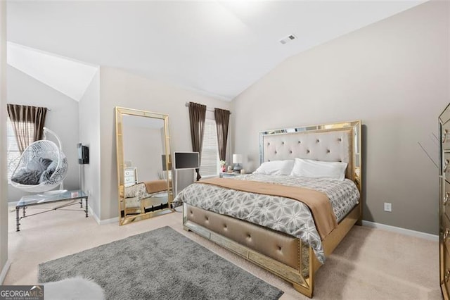 bedroom featuring lofted ceiling, visible vents, light carpet, and baseboards