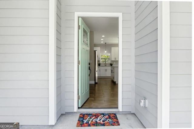 property entrance with a sink