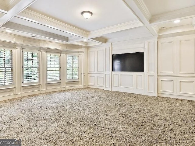 unfurnished living room featuring coffered ceiling, beamed ceiling, crown molding, carpet flooring, and a decorative wall