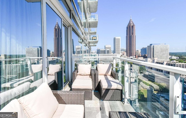 balcony featuring a view of city