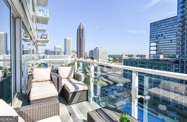 balcony featuring a view of city