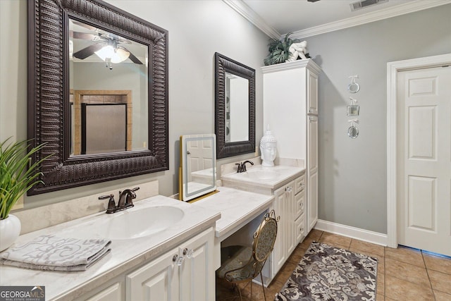 bathroom featuring ceiling fan, tile patterned flooring, vanity, baseboards, and crown molding