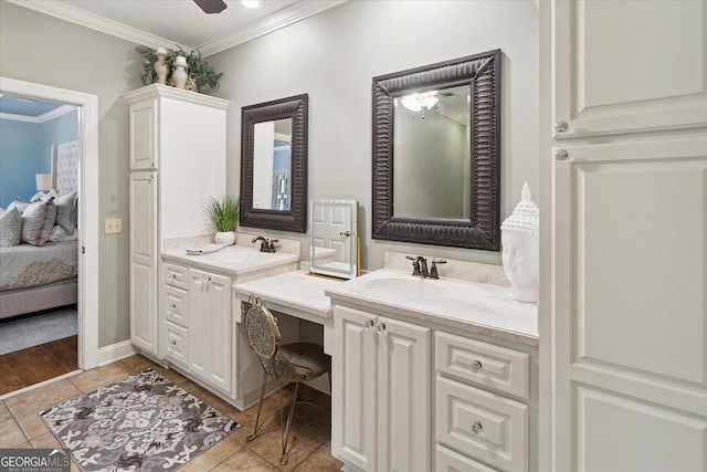 bathroom featuring tile patterned floors, ensuite bath, ornamental molding, and vanity