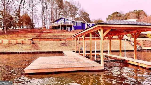 dock area featuring a water view