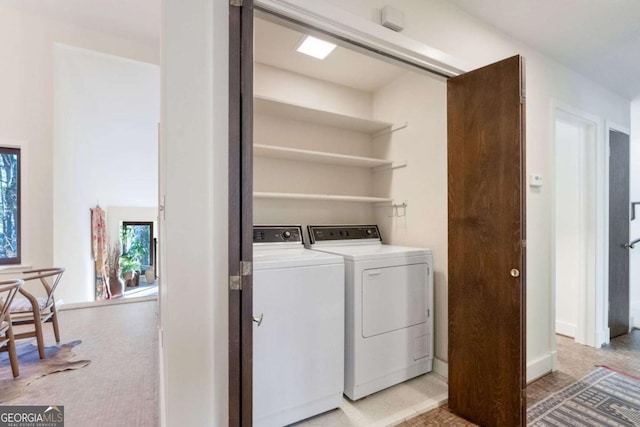 clothes washing area with laundry area and washing machine and dryer