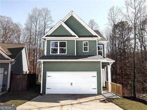 garage with driveway