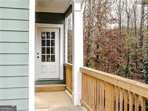 doorway to property with a balcony