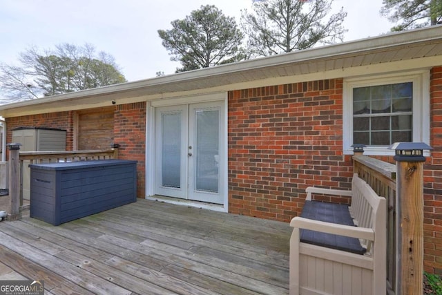 wooden terrace featuring french doors