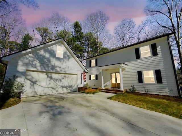 view of front of property featuring a garage