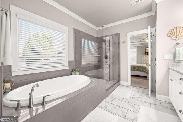 full bath with connected bathroom, ornamental molding, marble finish floor, a garden tub, and vanity