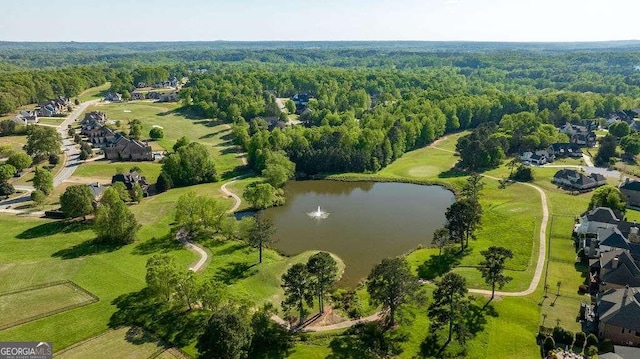 aerial view with a water view, a residential view, and a view of trees