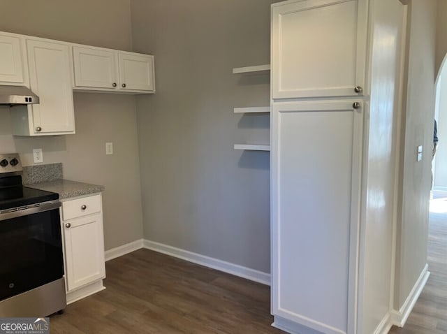 kitchen with under cabinet range hood, white cabinets, electric range, and open shelves