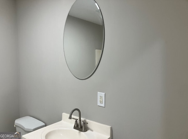 bathroom featuring a sink and toilet