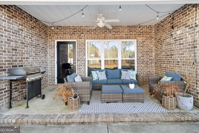 view of patio / terrace with ceiling fan, a grill, and an outdoor living space