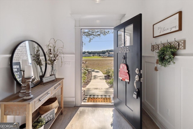 doorway featuring dark wood-style flooring