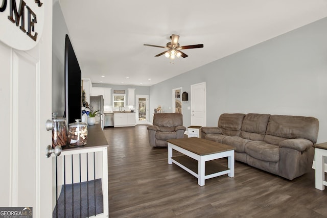 living area featuring dark wood-style floors, recessed lighting, and a ceiling fan