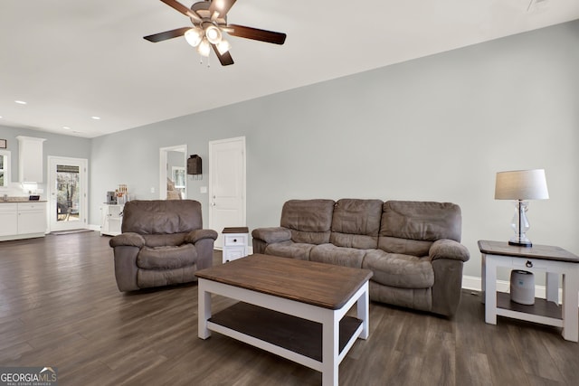 living room with recessed lighting, dark wood finished floors, a ceiling fan, and baseboards