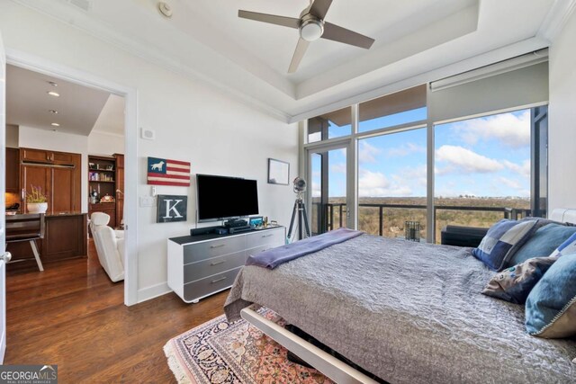3630 Peachtree Rd NE Unit 1809, Atlanta, GA 30326 - bedroom with dark wood finished floors, recessed lighting, a raised ceiling, and ceiling fan